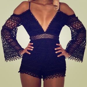 Black lace v neck romper never been worn *sold